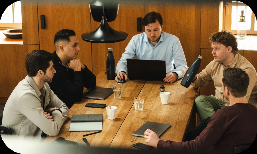 Task force team in discussion during a strategy session